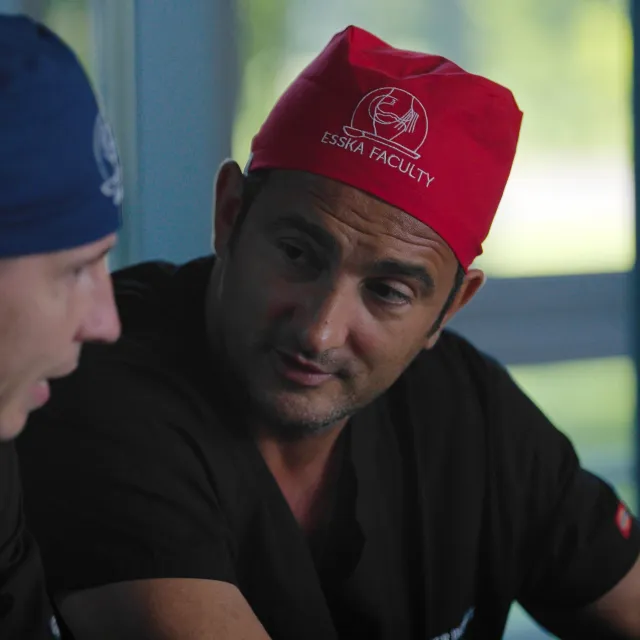 Two surgeons in conversation